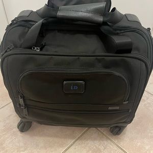Tumi small 4 wheel suitcase